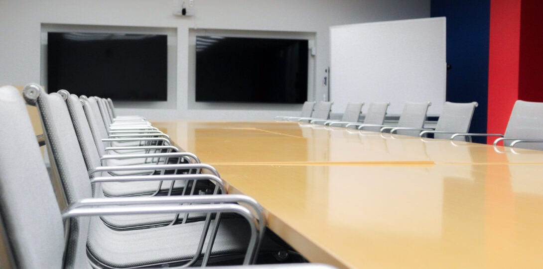 large conference room with long table and chairs